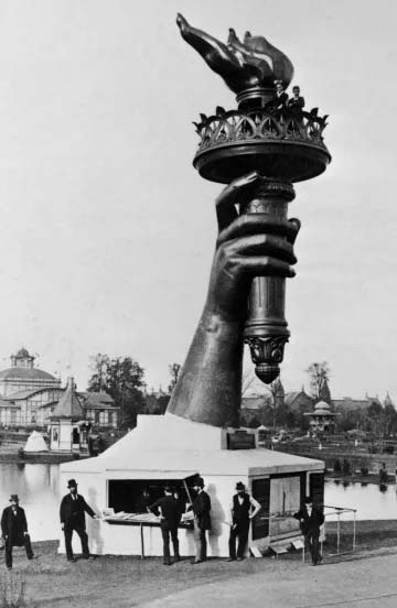 Statue of Liberty arm and torch in Madison Square Park during the Gilded Age